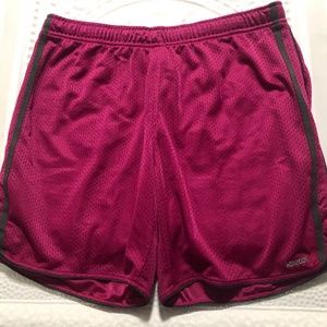 Reebok magenta women’s athletic shorts, size L